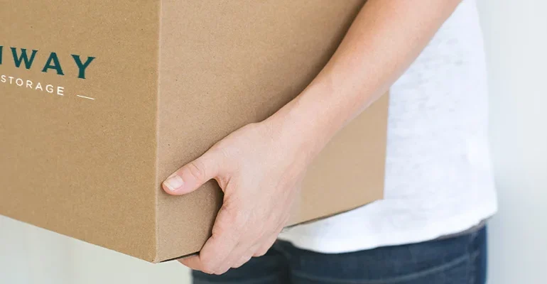 Person-holding-Steinway-moving-box